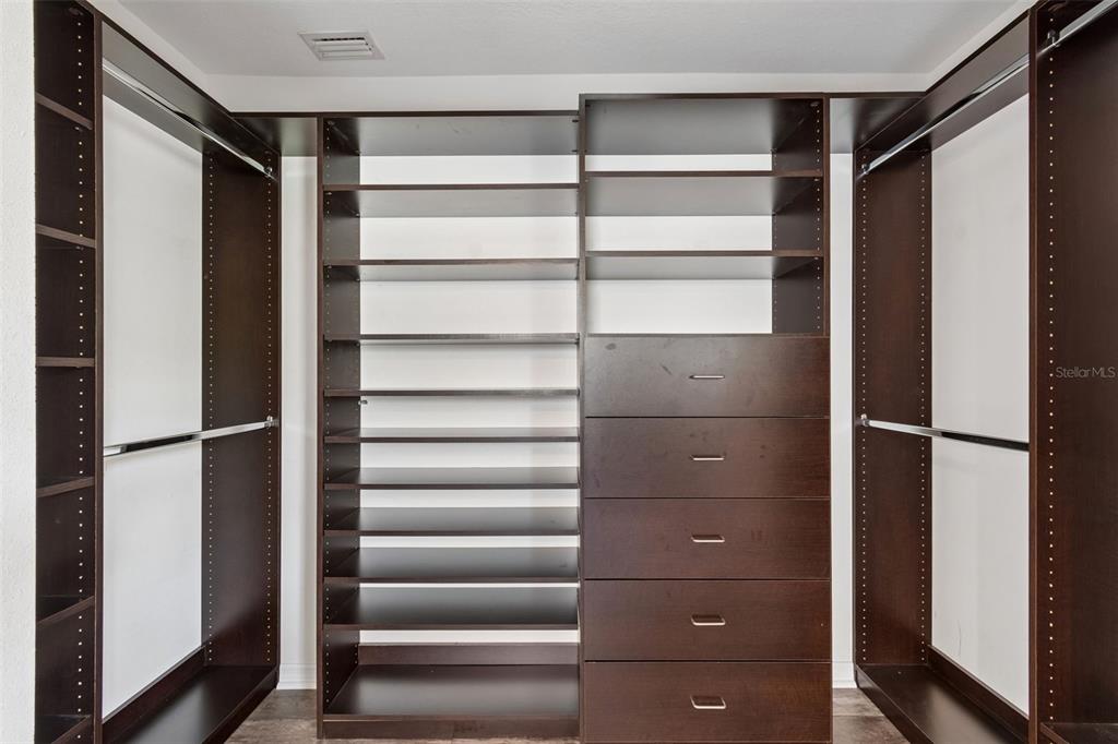 4018 Prado Drive Sarasota, FL 34235 - Photo 54 of 74 a view of walk in closet with empty racks
