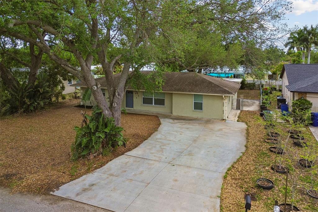 4018 Prado Drive Sarasota, FL 34235 - Photo 67 of 74 front view of a house with a yard