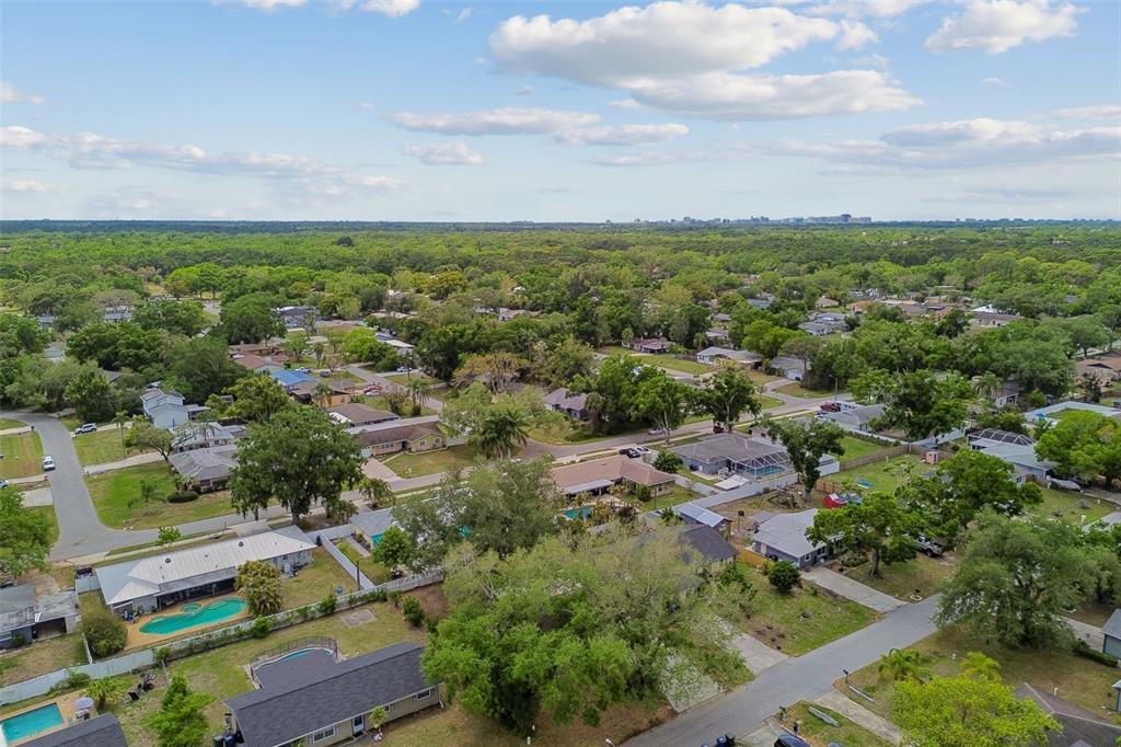 4018 Prado Drive Sarasota, FL 34235 - Photo 68 of 74 an aerial view of residential house with outdoor space and trees all around