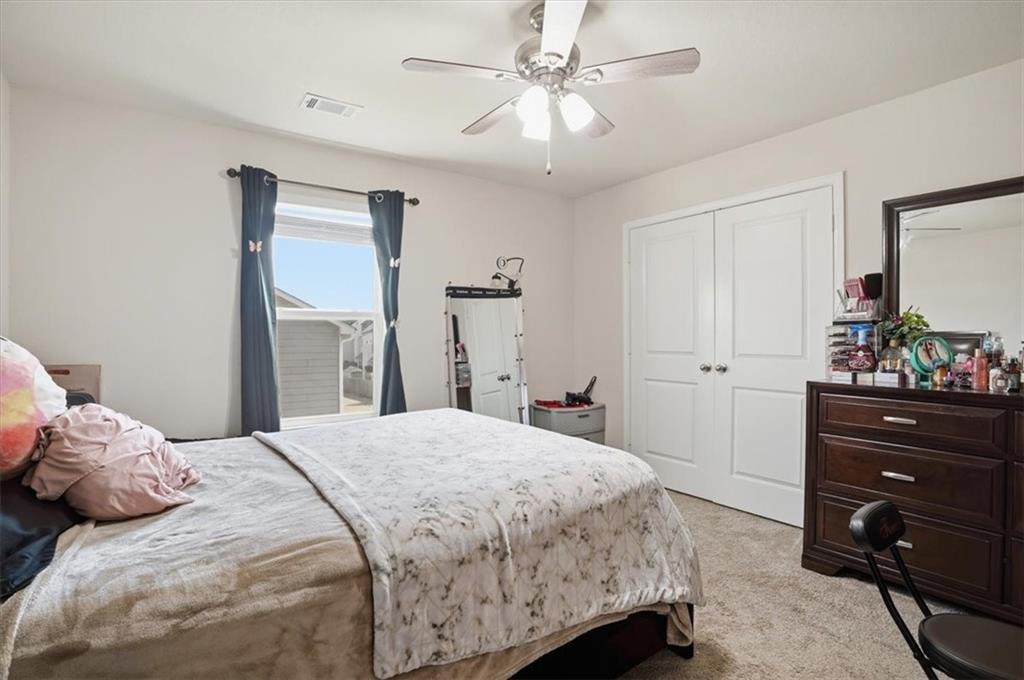 222 Seasons Valley Pendergrass, GA 30567 - Photo 18 of 30 a bedroom with a bed and a dresser