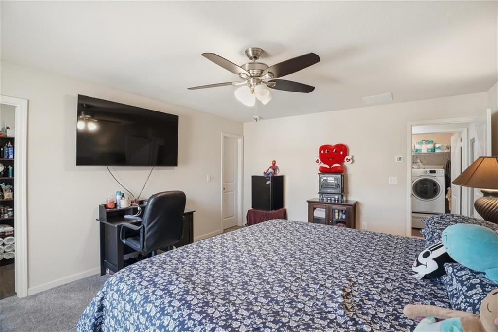 222 Seasons Valley Pendergrass, GA 30567 - Photo 26 of 30 a bedroom with a bed and a flat screen tv