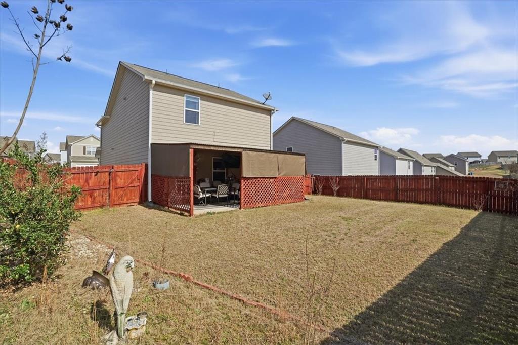222 Seasons Valley Pendergrass, GA 30567 - Photo 29 of 30 a view of a house with a patio