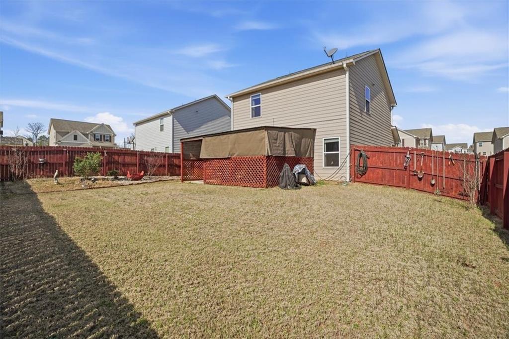 222 Seasons Valley Pendergrass, GA 30567 - Photo 30 of 30 a view of a house with a yard