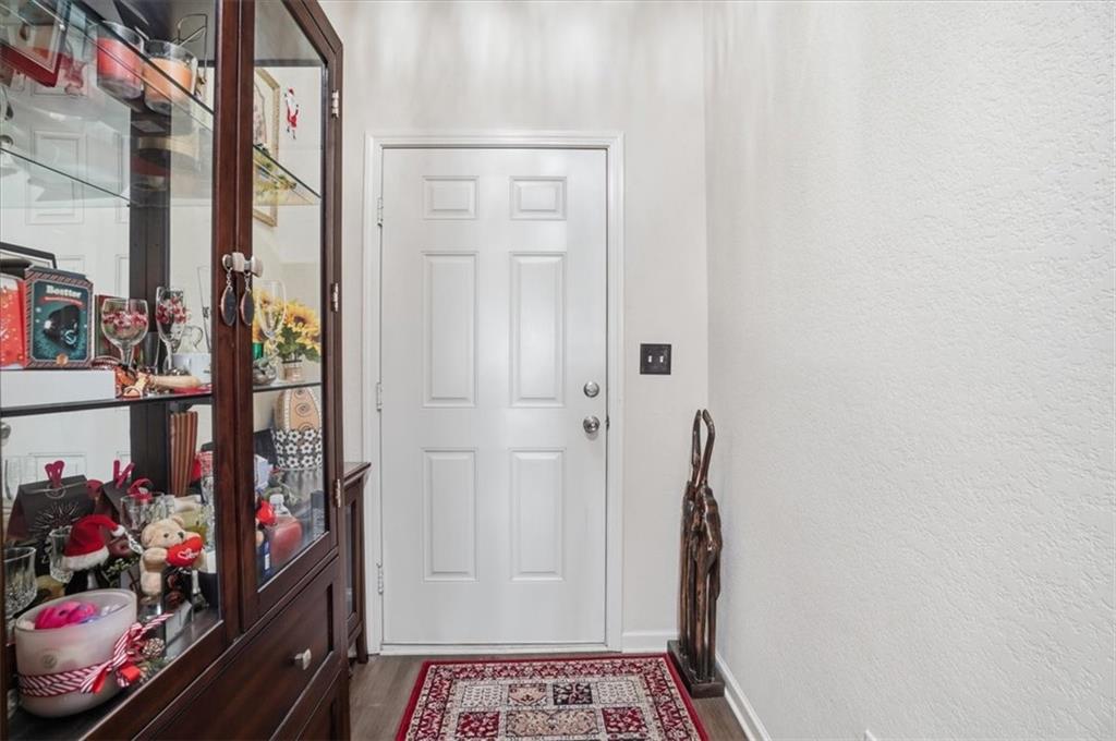 222 Seasons Valley Pendergrass, GA 30567 - Photo 6 of 30 a view of hallway with stairs and toys