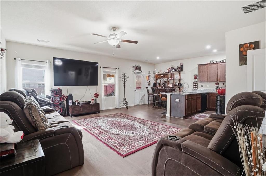 222 Seasons Valley Pendergrass, GA 30567 - Photo 7 of 30 a living room with furniture and a flat screen tv