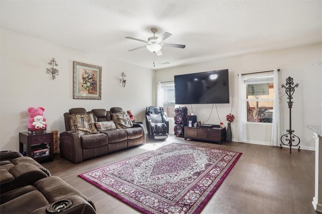 222 Seasons Valley Pendergrass, GA 30567 - Photo 8 of 30 a living room with furniture and a flat screen tv