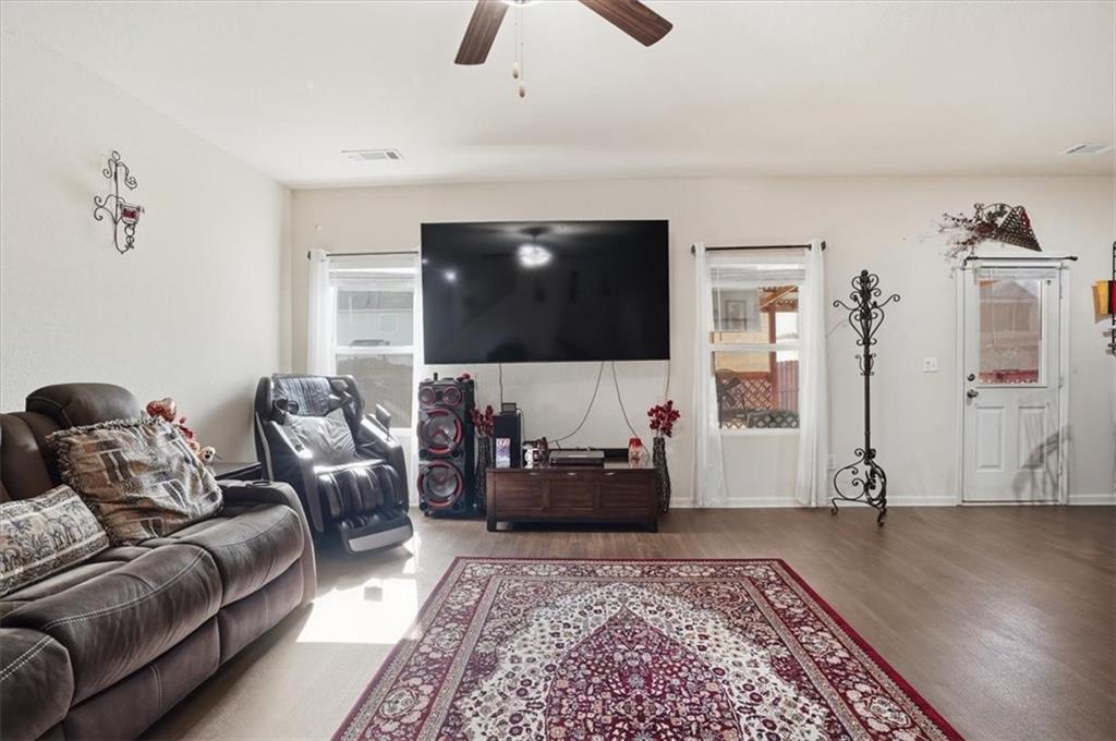 222 Seasons Valley Pendergrass, GA 30567 - Photo 9 of 30 a living room with furniture and a flat screen tv