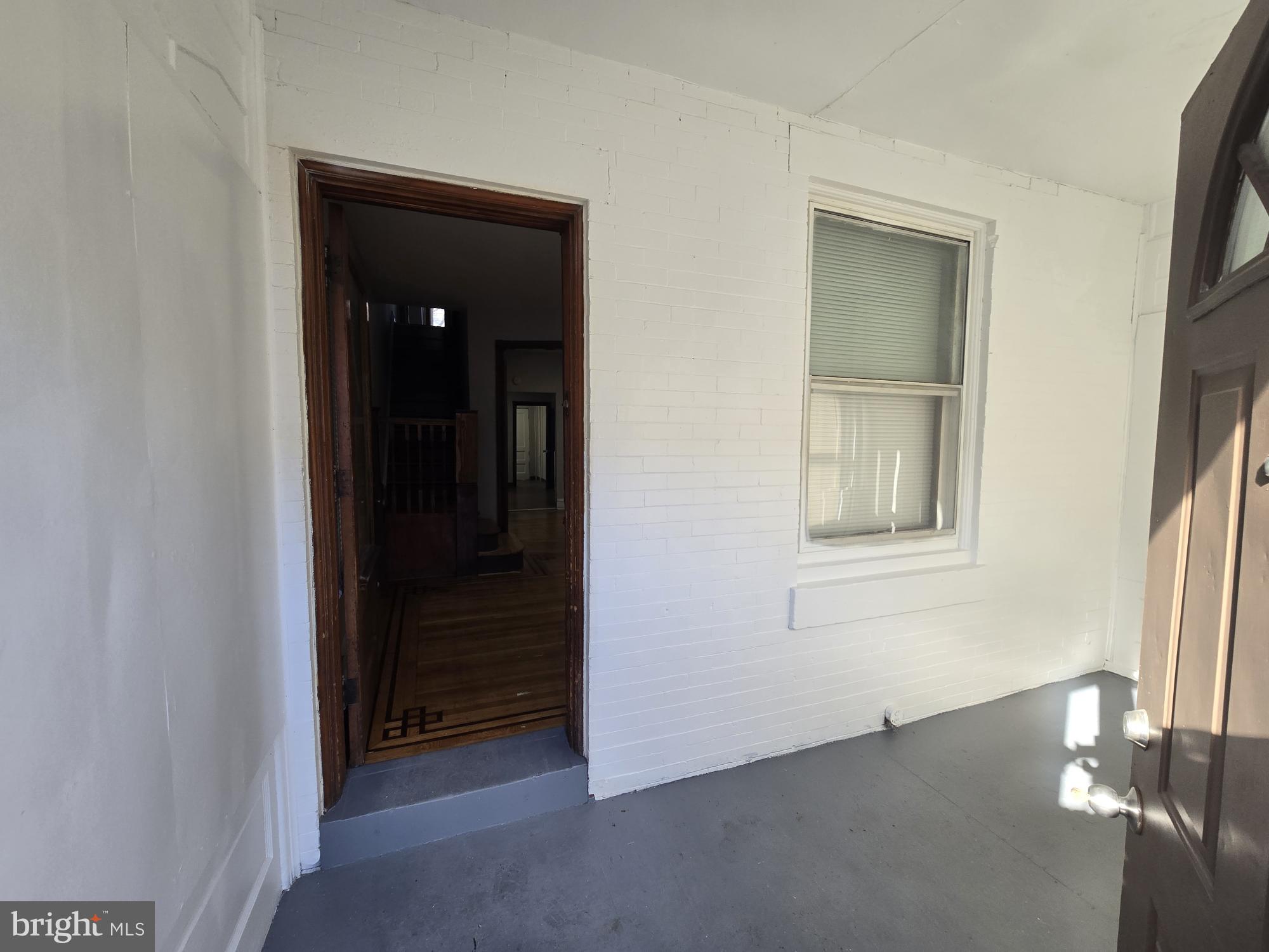 4254 North 7th Street Philadelphia, PA 19140 - Photo 2 of 26 an empty room with windows