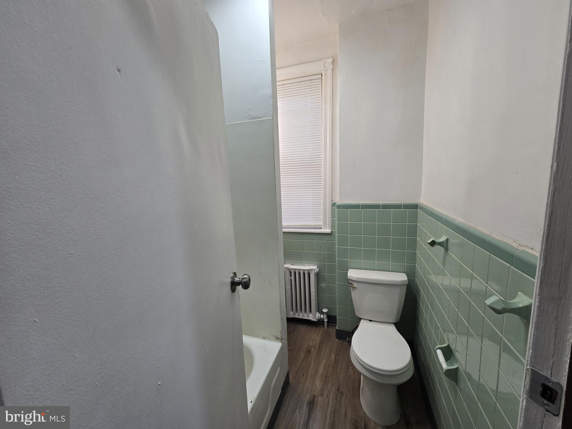 4254 North 7th Street Philadelphia, PA 19140 - Photo 22 of 26 a bathroom with a toilet and a sink