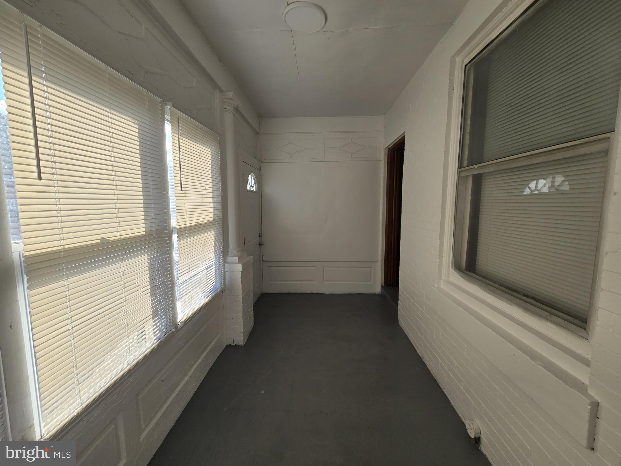 4254 North 7th Street Philadelphia, PA 19140 - Photo 4 of 26 a view of an empty room and window