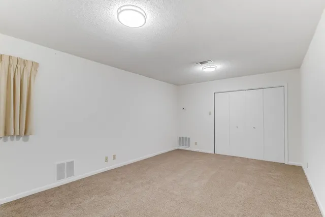 an empty room with window