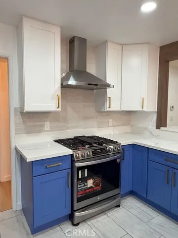 an empty room with a ceiling fan and window