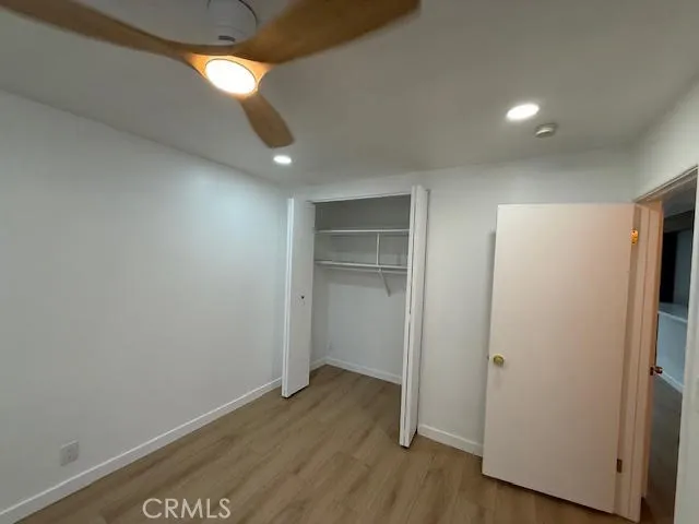 a bathroom with a sink vanity and mirror