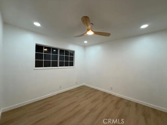 a bathroom with a toilet and shower