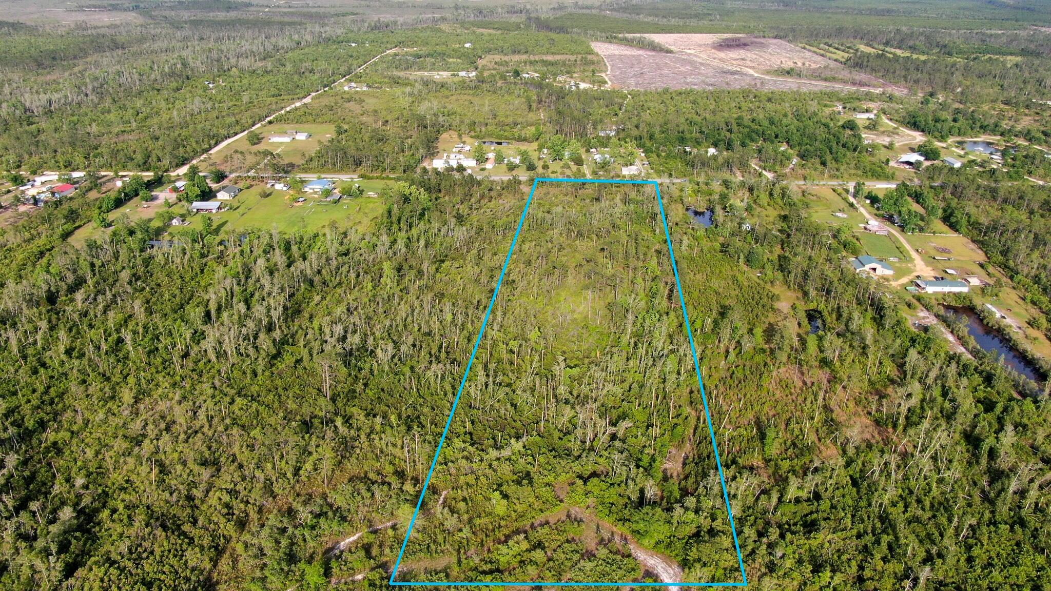 Tbd Sorrells Road Fountain, FL 32438 - Photo 4 of 7 a aerial view of residential houses with yard