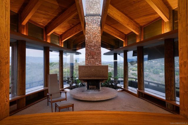 a view of a two chairs in the patio