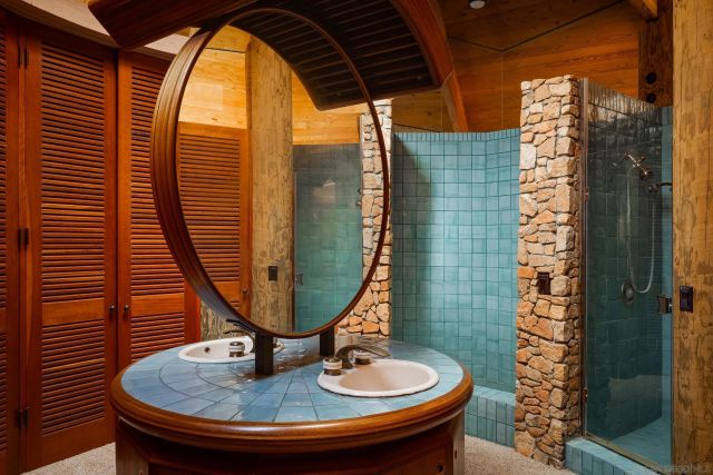 a bedroom with a bed and a chair