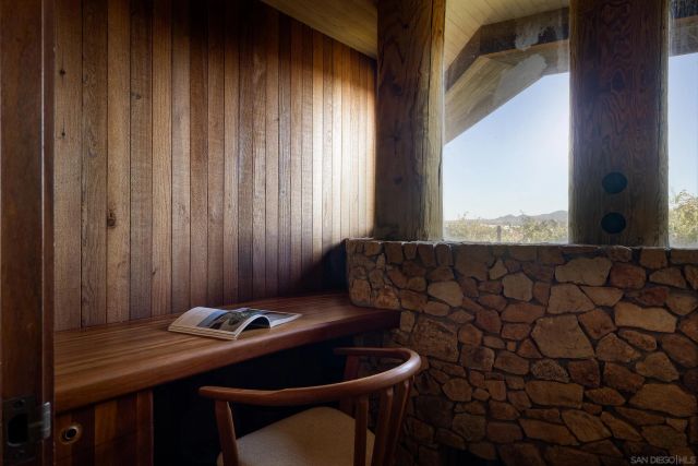 a view of a roof deck with a bed