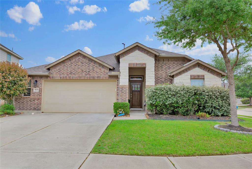 9715 Messina Crest Court Richmond, TX 77406 - Photo 1 of 29 a front view of a house with a yard and garage