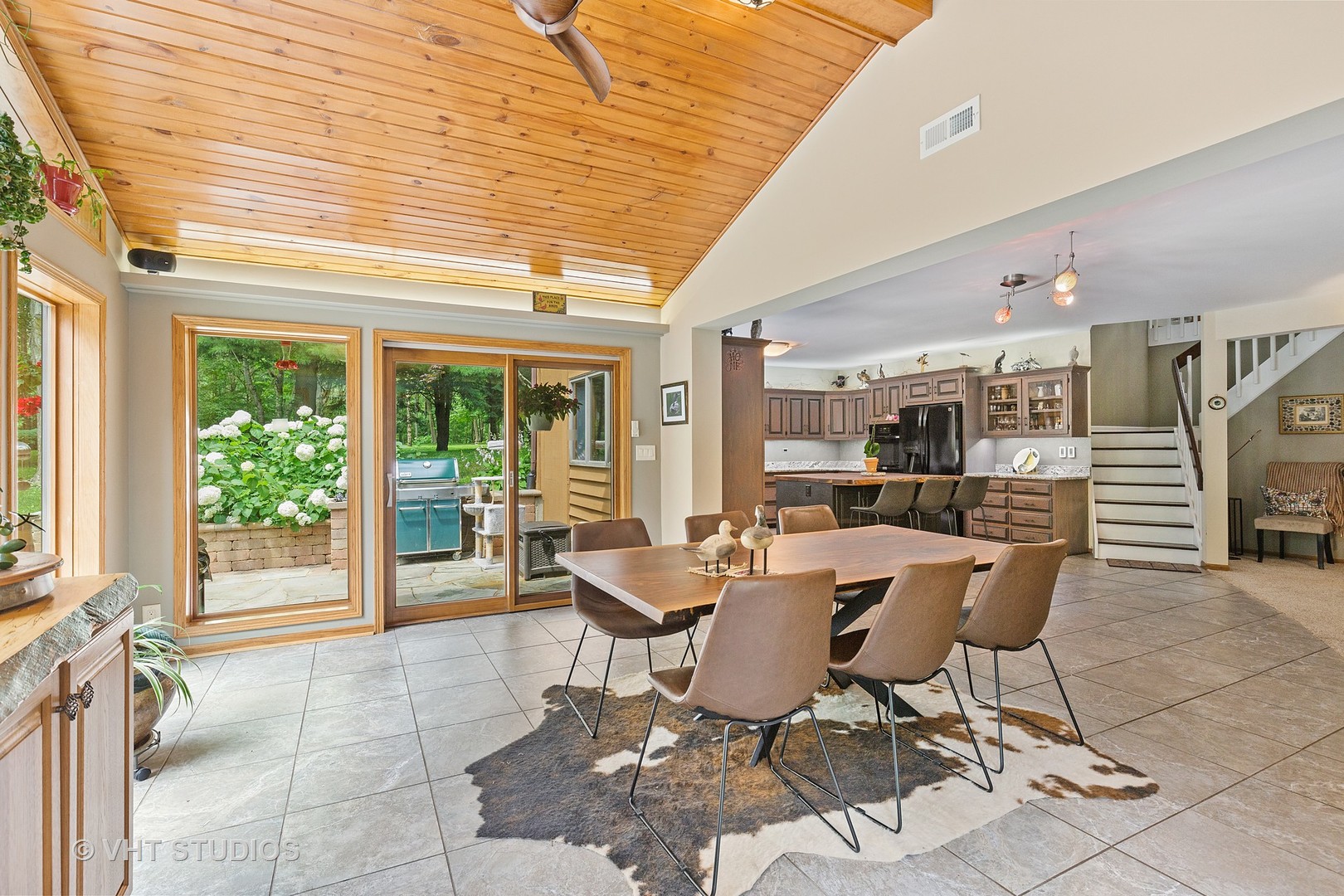 9N483 Muirhead Road Elgin, IL 60124 - Photo 15 of 40 a dining room with furniture and large windows