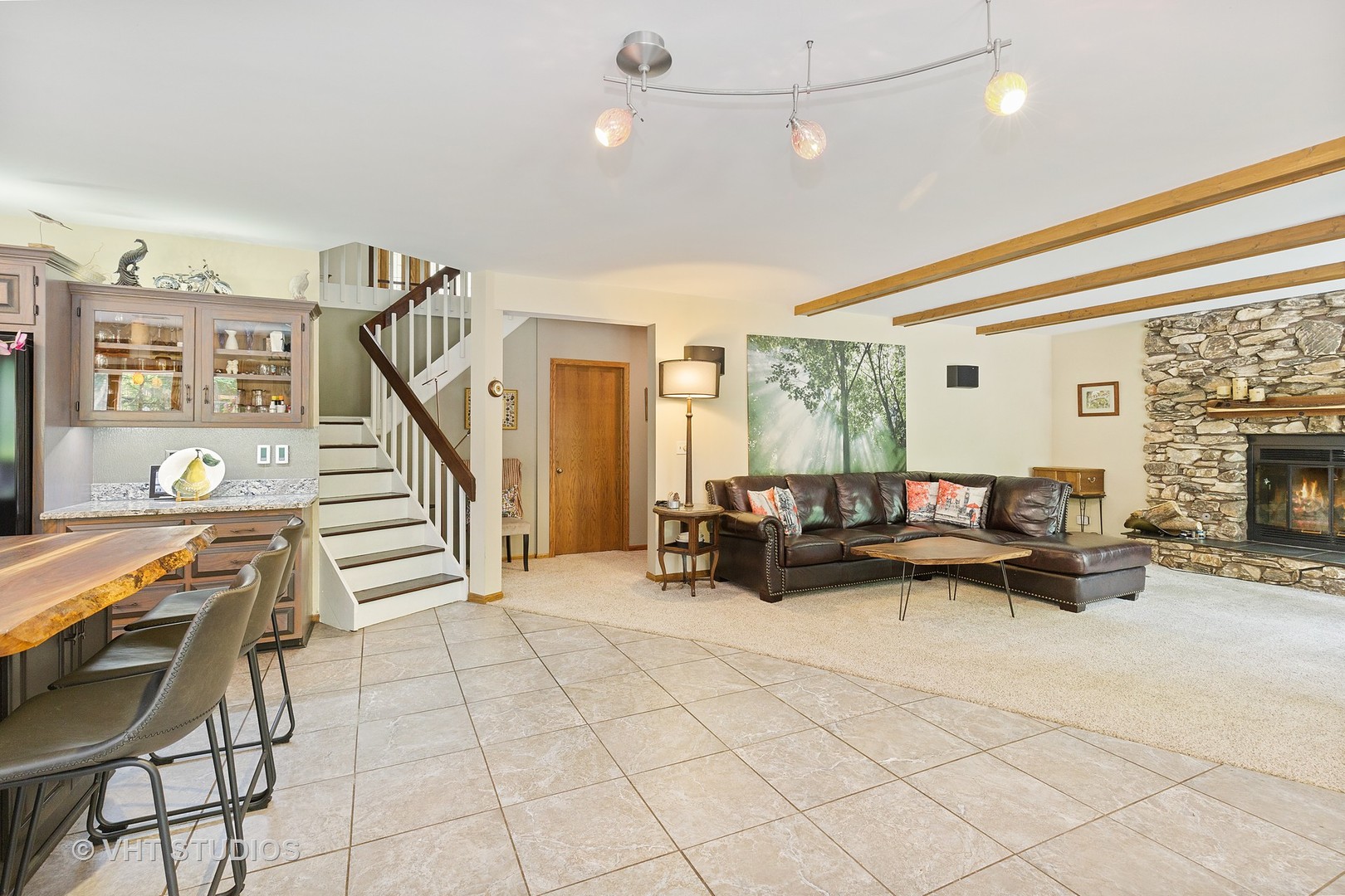 9N483 Muirhead Road Elgin, IL 60124 - Photo 21 of 40 a living room with furniture and a fireplace
