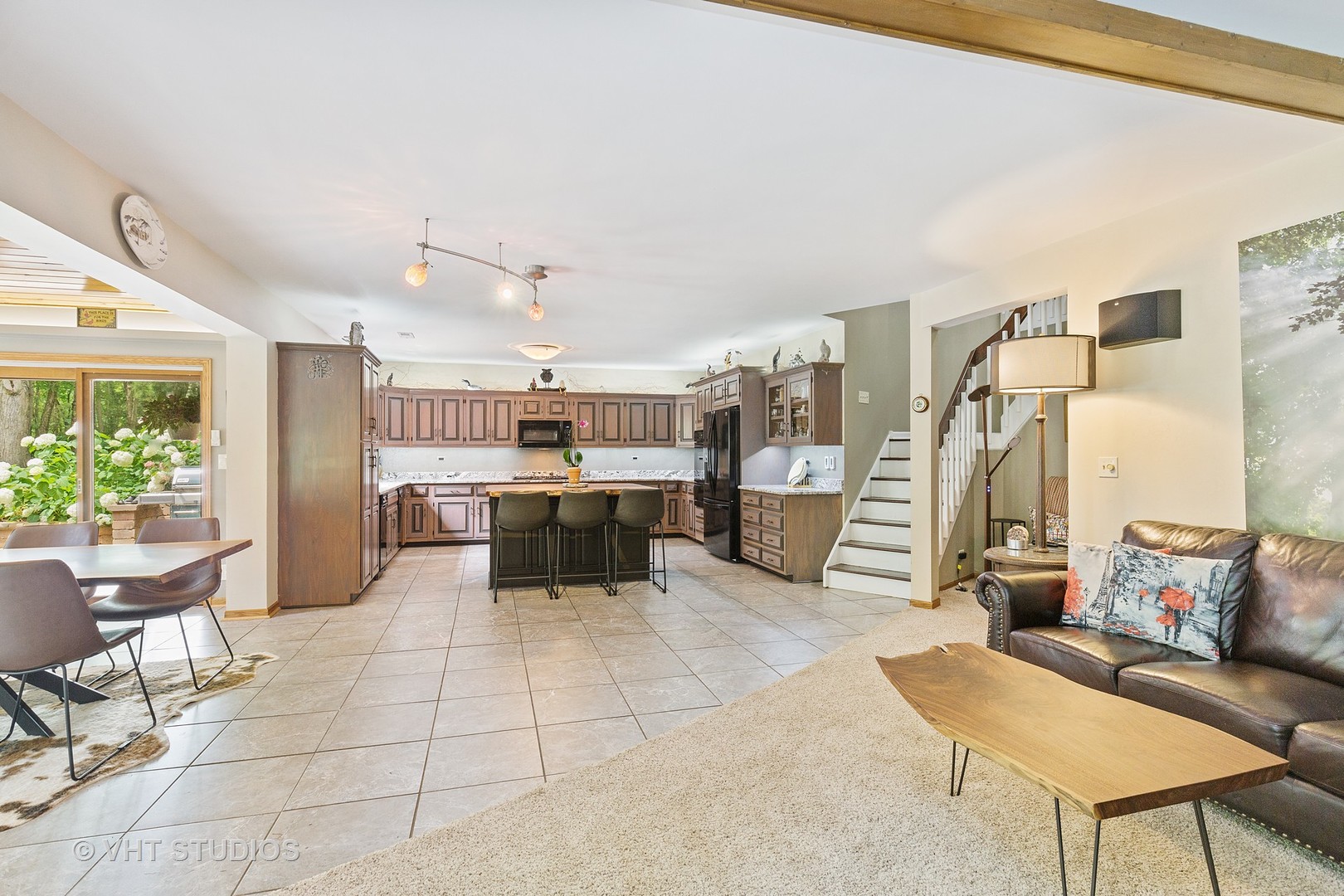 9N483 Muirhead Road Elgin, IL 60124 - Photo 22 of 40 a living room with furniture and a large window