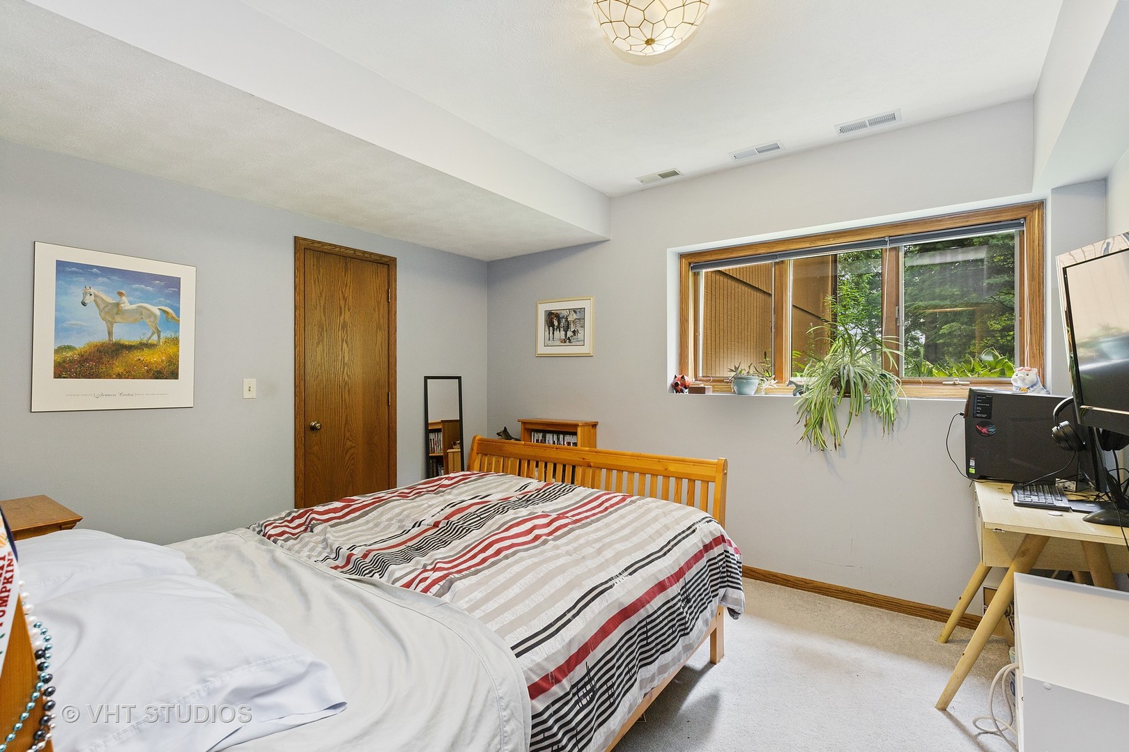 9N483 Muirhead Road Elgin, IL 60124 - Photo 23 of 40 a bedroom with a bed and wooden floor