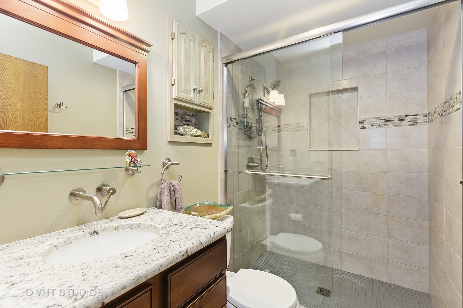 9N483 Muirhead Road Elgin, IL 60124 - Photo 24 of 40 a bathroom with a granite countertop sink toilet a mirror and shower