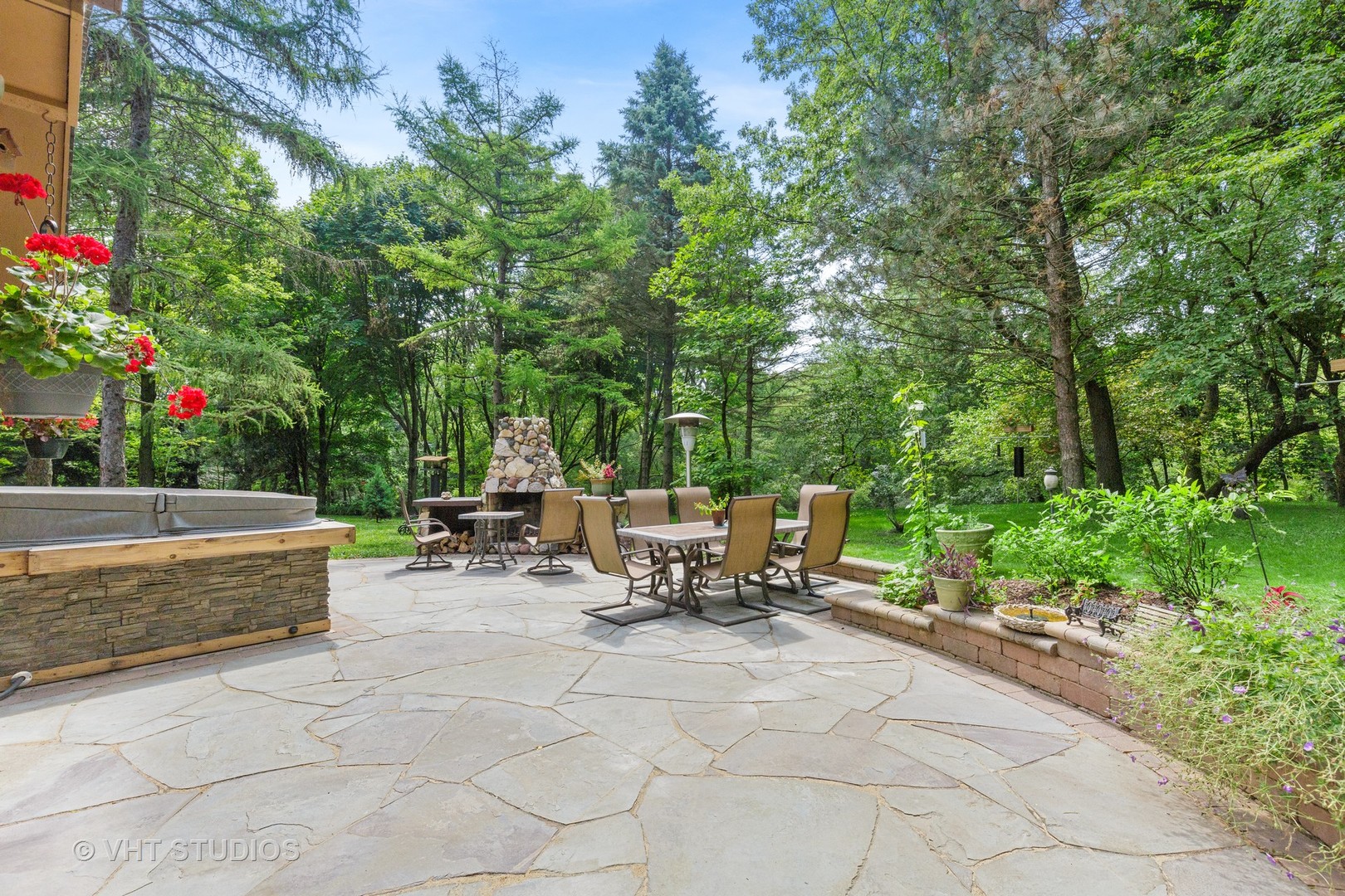 9N483 Muirhead Road Elgin, IL 60124 - Photo 26 of 40 a view of backyard with a table and chairs