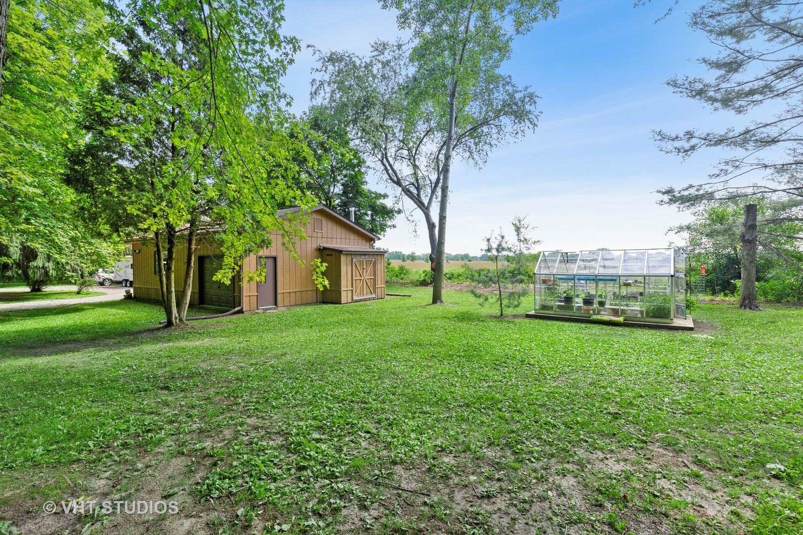 9N483 Muirhead Road Elgin, IL 60124 - Photo 29 of 40 a view of a house with backyard and garden