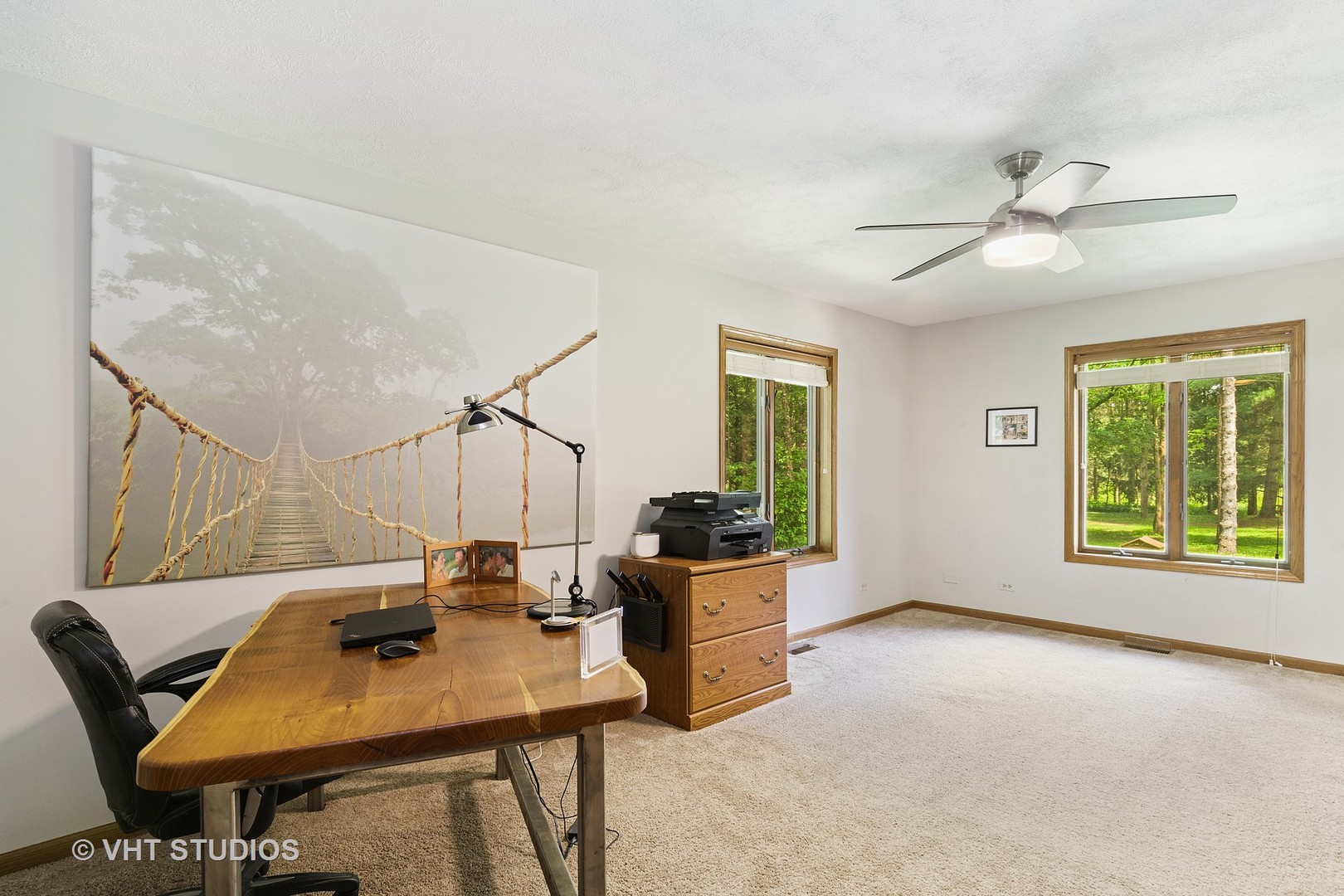 9N483 Muirhead Road Elgin, IL 60124 - Photo 10 of 40 a view of a workspace with furniture and a window