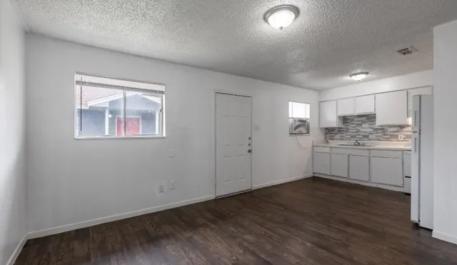 a view of kitchen with wooden floor