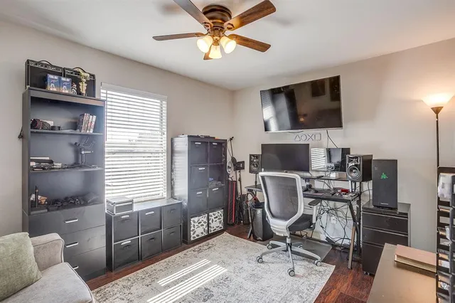 a workspace with furniture and a window