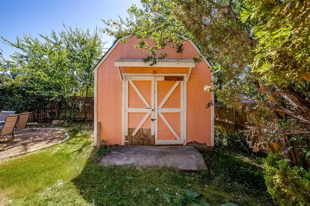 a front view of house with garden