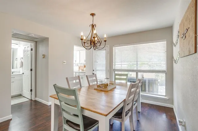 a dining room with furniture window wooden floor
