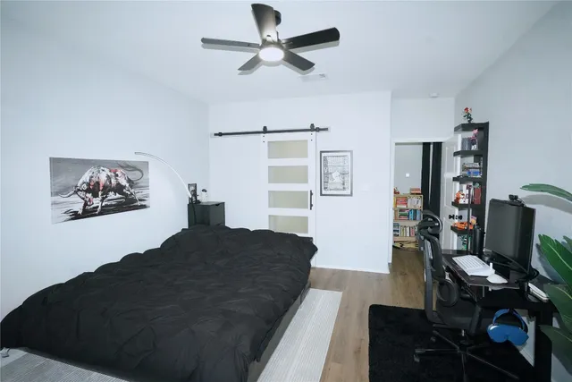 a bedroom with a bed and furniture