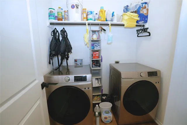a utility room with dryer and washer