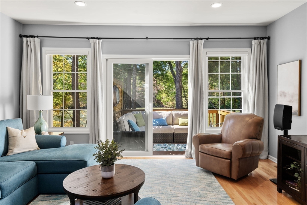 14 Iris Court, Unit 14 Canton, MA 02021 - Photo 12 of 42 a living room with furniture and a large window