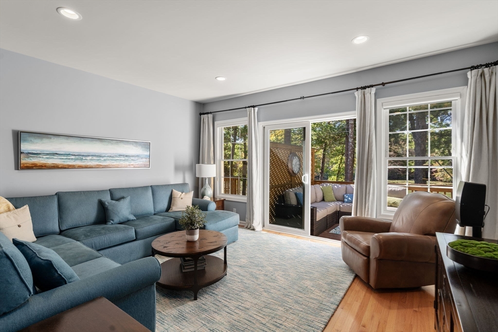 14 Iris Court, Unit 14 Canton, MA 02021 - Photo 13 of 42 a living room with furniture and a large window