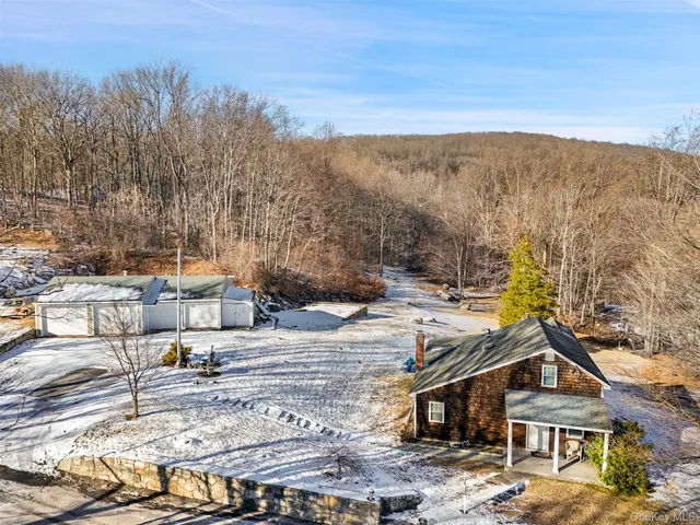 a view of a town with trees and houses
