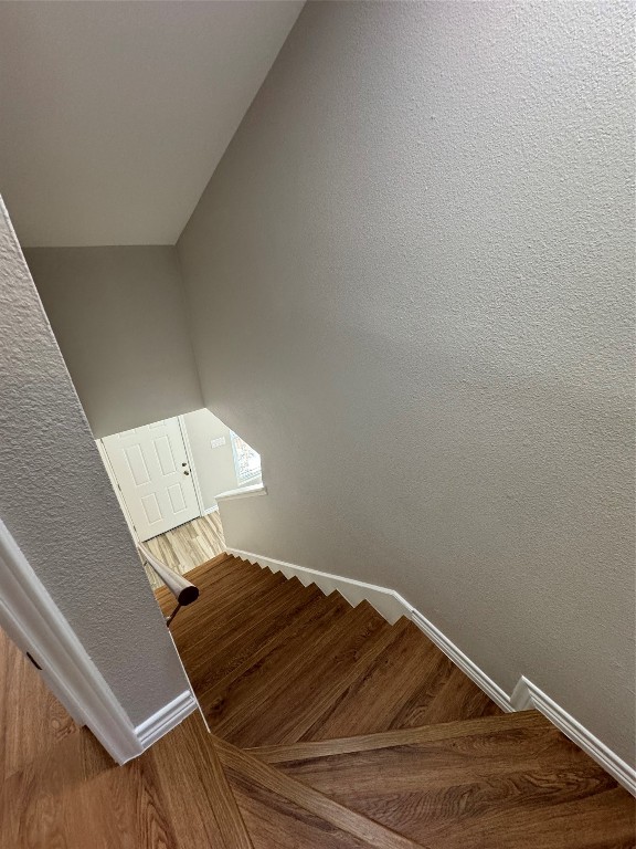 12804 Copper Cliff Avenue, Unit B Austin, TX 78727 - Photo 16 of 29 a bed sitting in a bedroom next to a cabinet