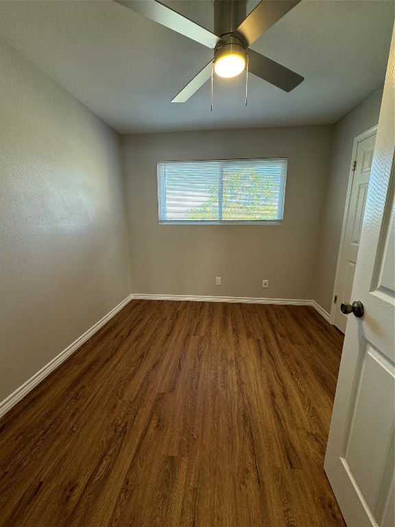 12804 Copper Cliff Avenue, Unit B Austin, TX 78727 - Photo 22 of 29 wooden floor in an empty room with a window