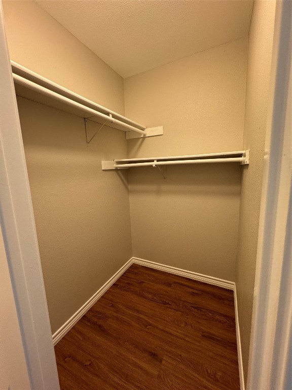 12804 Copper Cliff Avenue, Unit B Austin, TX 78727 - Photo 23 of 29 a view of a room with wooden floor
