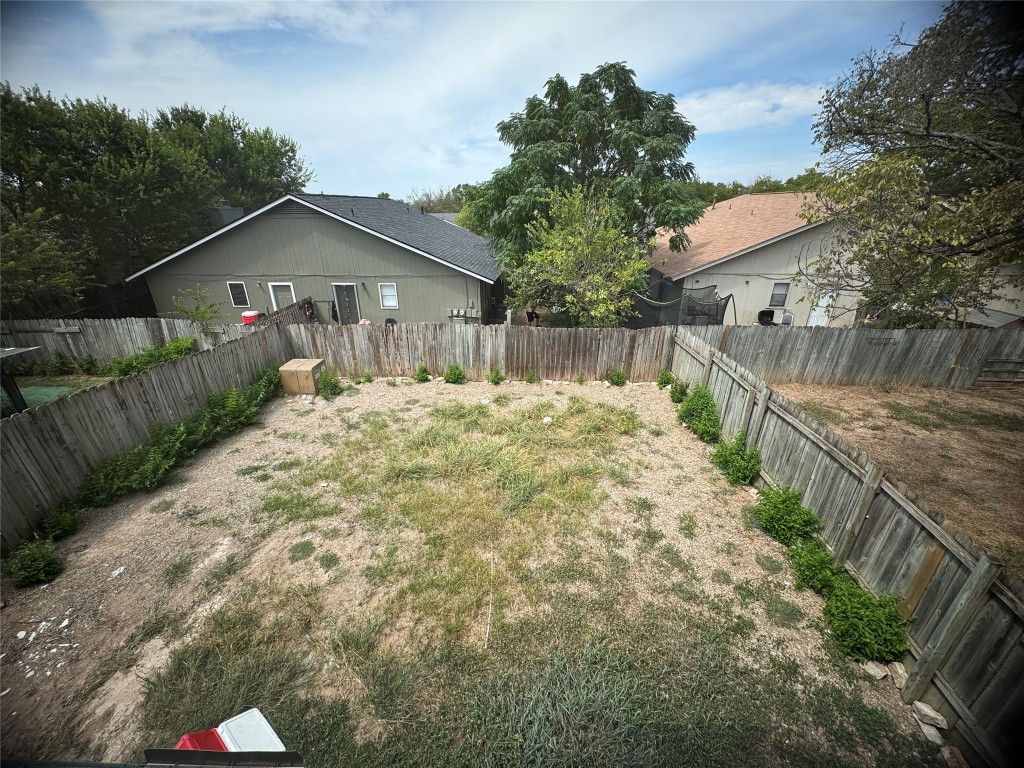 12804 Copper Cliff Avenue, Unit B Austin, TX 78727 - Photo 25 of 29 a view of a house with wooden fence