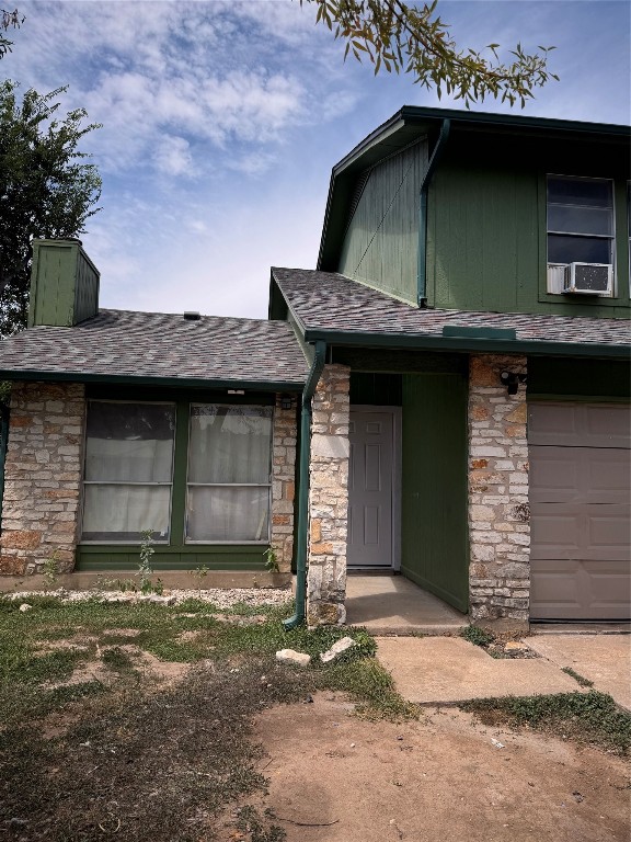 12804 Copper Cliff Avenue, Unit B Austin, TX 78727 - Photo 27 of 29 a front view of a house