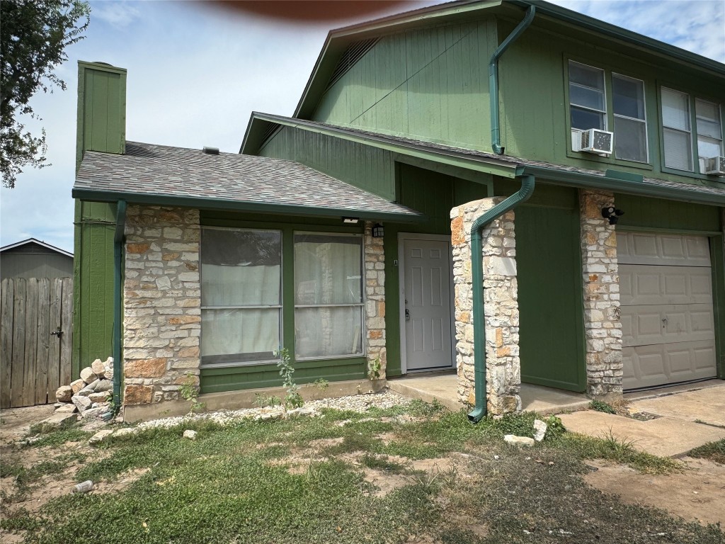 12804 Copper Cliff Avenue, Unit B Austin, TX 78727 - Photo 29 of 29 a front view of a house