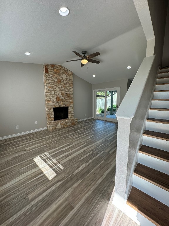 12804 Copper Cliff Avenue, Unit B Austin, TX 78727 - Photo 5 of 29 wooden floor in an empty room with a fireplace