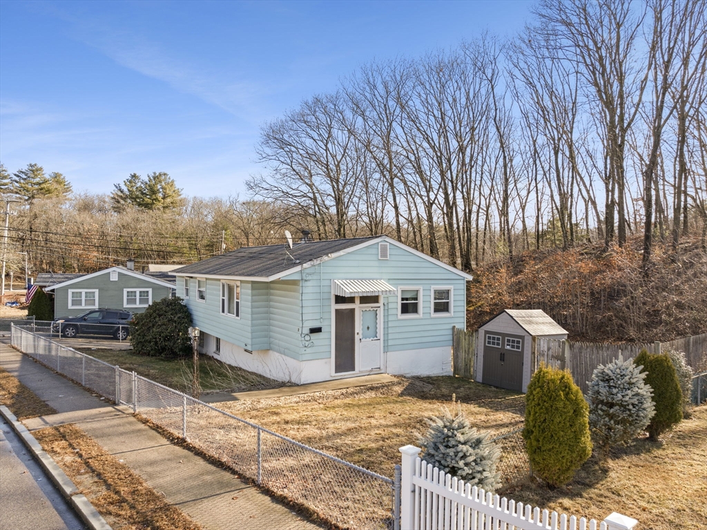 2 Alwin Street Boston, MA 02136 - Photo 1 of 43 a front view of a house with a yard