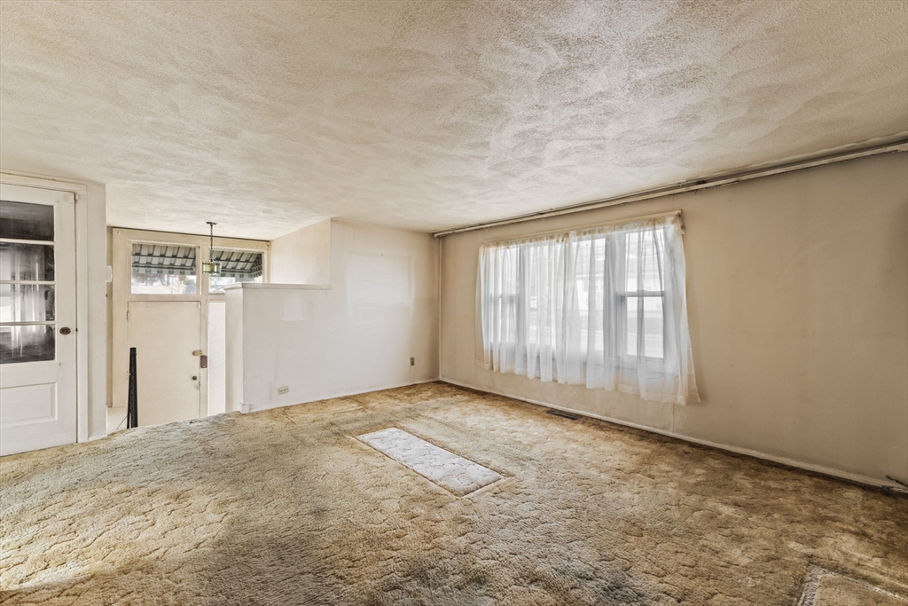 2 Alwin Street Boston, MA 02136 - Photo 14 of 43 an empty room with windows