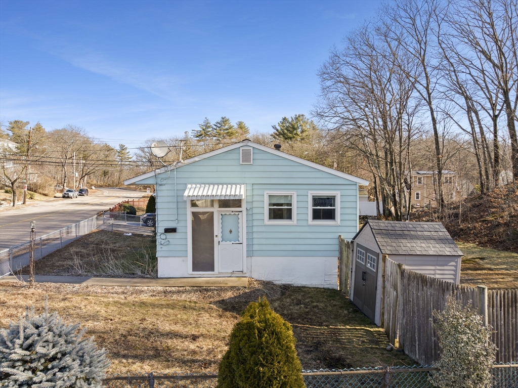 2 Alwin Street Boston, MA 02136 - Photo 3 of 43 a front view of a house with a yard